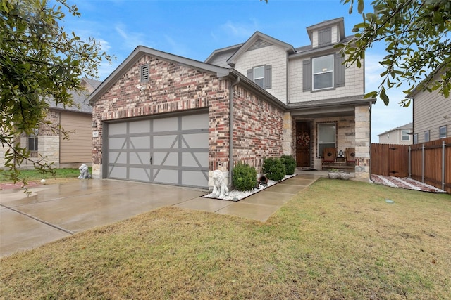 view of front of house featuring a garage and a front lawn