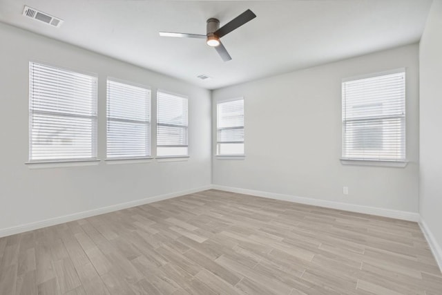 unfurnished room with ceiling fan and light hardwood / wood-style flooring