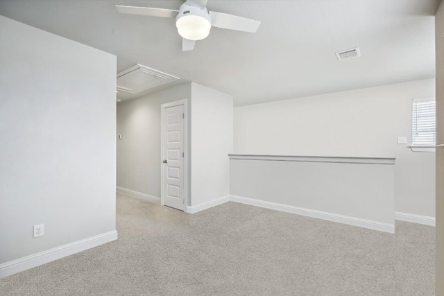 carpeted empty room with ceiling fan