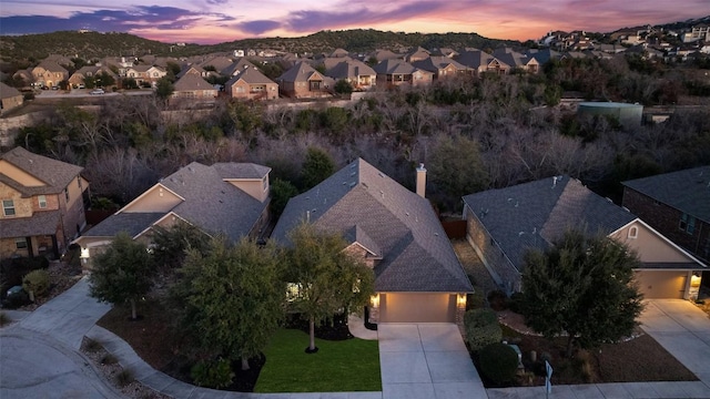 view of aerial view at dusk