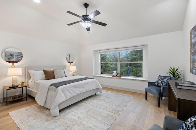 bedroom featuring light hardwood / wood-style flooring and ceiling fan