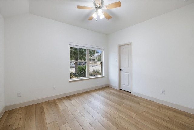 spare room featuring ceiling fan and light hardwood / wood-style floors