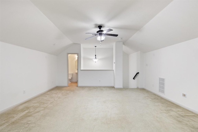 bonus room featuring vaulted ceiling, carpet floors, and ceiling fan