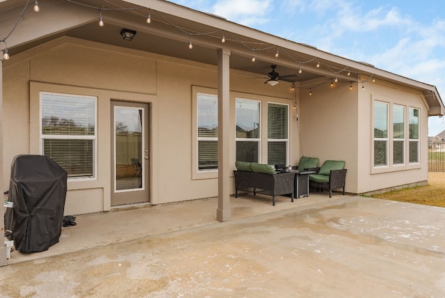 view of patio featuring grilling area, outdoor lounge area, and ceiling fan