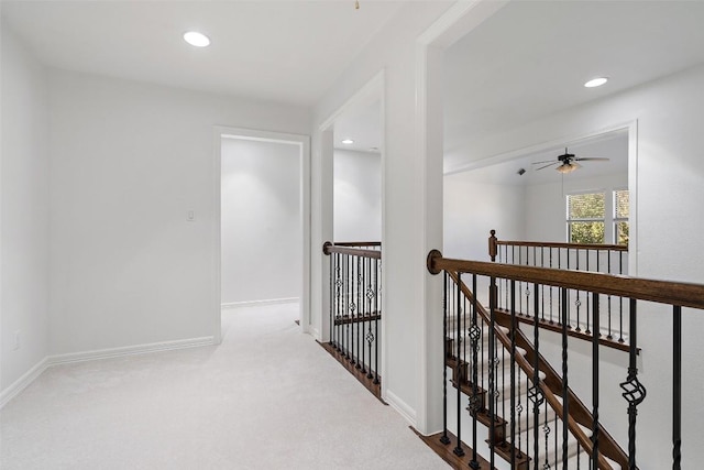 172 Mirafield Ln, Austin, TX 78737 - hall featuring an upstairs landing, carpet flooring, recessed lighting, and baseboards