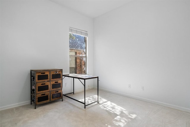 empty room featuring light colored carpet