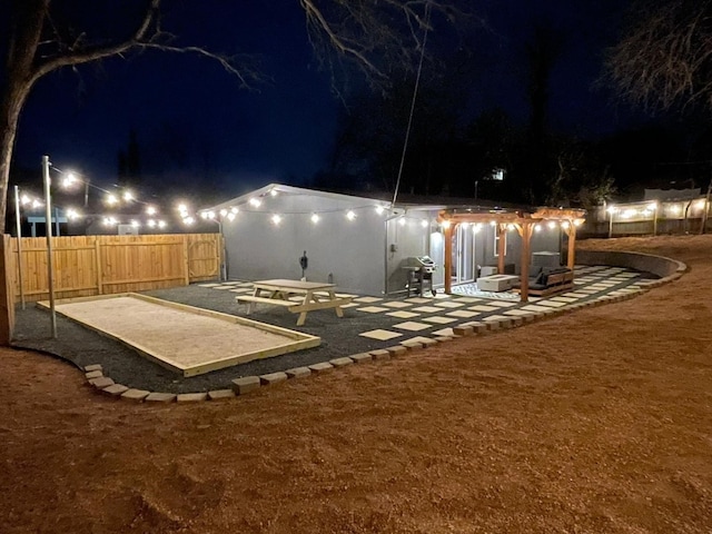 view of yard at night