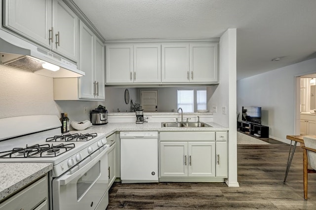 kitchen featuring sink, a textured ceiling, dark hardwood / wood-style flooring, white appliances, and white cabinets