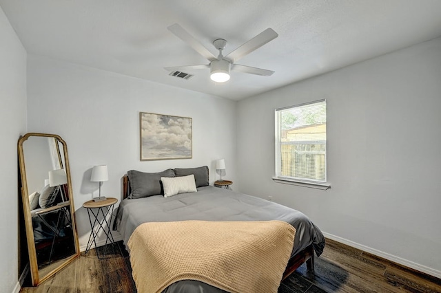 bedroom featuring dark wood-type flooring and ceiling fan