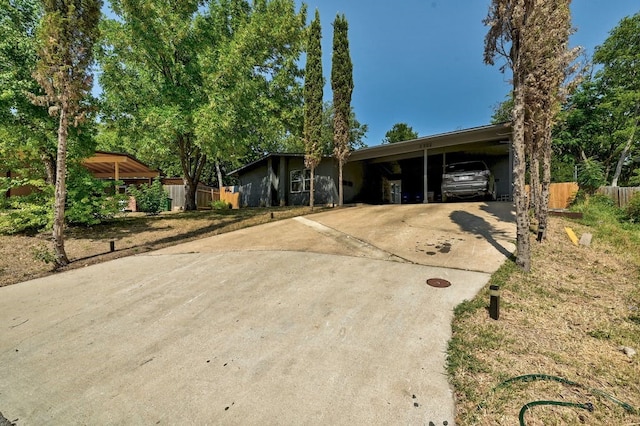 single story home with a carport