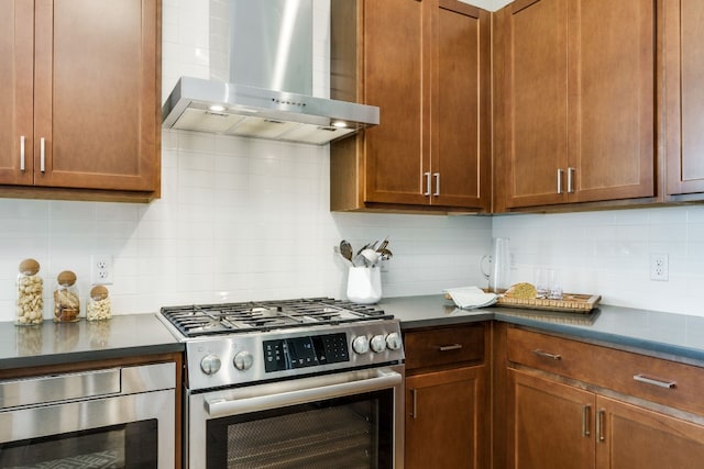 kitchen featuring wall oven, range hood, gas stove, and backsplash