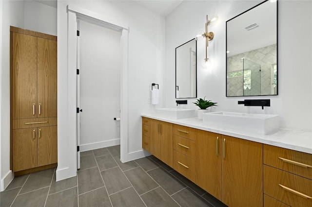 bathroom featuring vanity and walk in shower