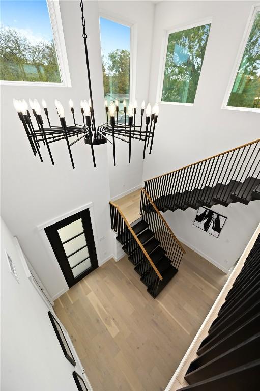 staircase featuring hardwood / wood-style floors