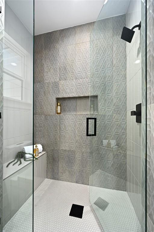 bathroom with an enclosed shower