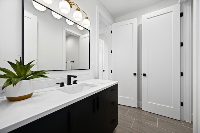 bathroom featuring vanity and tile patterned flooring