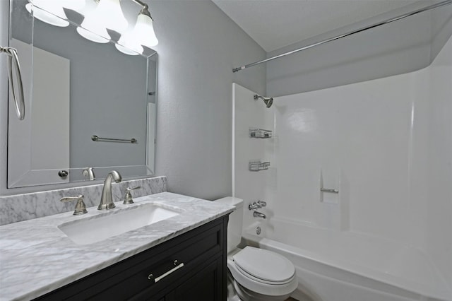 full bathroom with vanity, tub / shower combination, and toilet