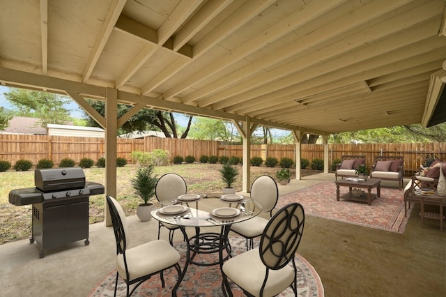 view of patio featuring a grill