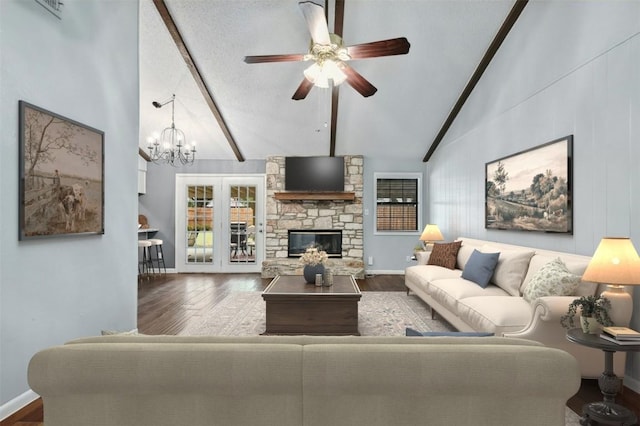 living room featuring a stone fireplace, high vaulted ceiling, and hardwood / wood-style flooring