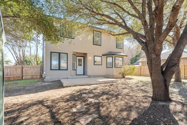 view of front of property with a patio area