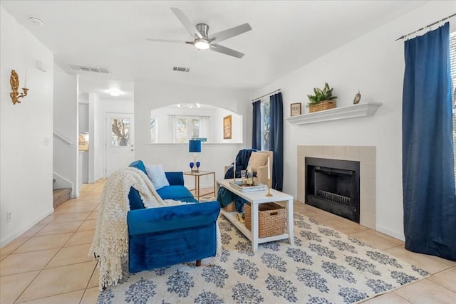311 Juniper Dr, Georgetown, TX 78626 - tiled living area featuring a ceiling fan, visible vents, and plenty of natural light