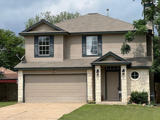 311 Juniper Dr, Georgetown, TX 78626 - traditional home with a shingled roof, an attached garage, and driveway
