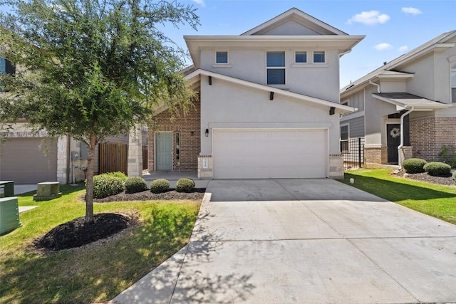 view of front property with a garage and a front lawn