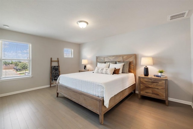 bedroom featuring hardwood / wood-style floors