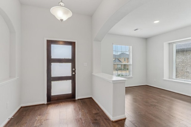 entryway featuring dark wood-type flooring