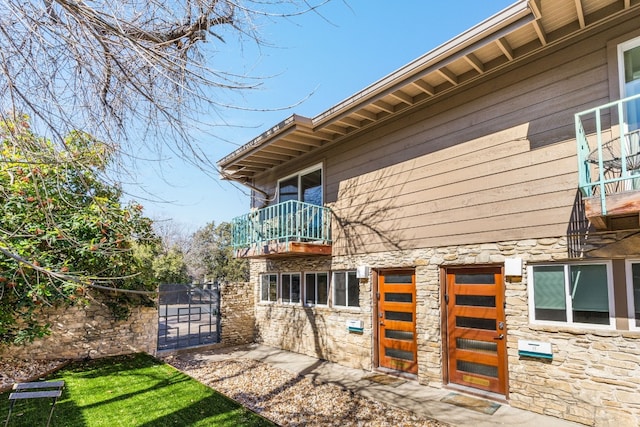 exterior space featuring a balcony