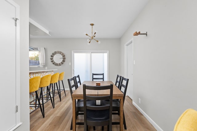 dining area with light wood-type flooring