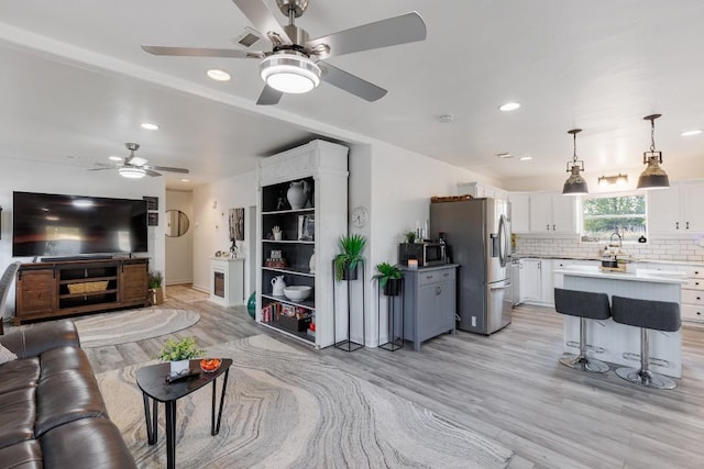 living room featuring light wood-type flooring