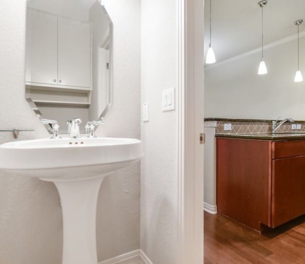 bathroom featuring sink and hardwood / wood-style flooring