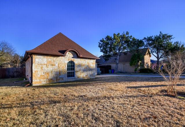 exterior space featuring a yard