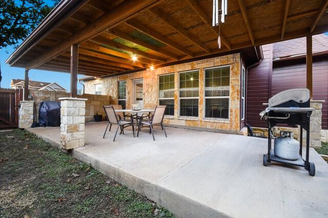 view of patio with a grill