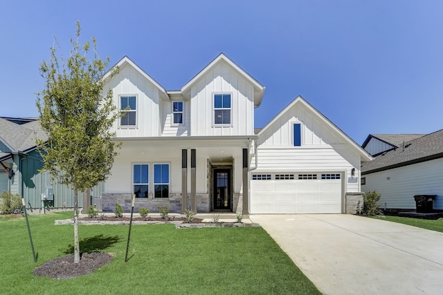 modern farmhouse with a garage and a front yard