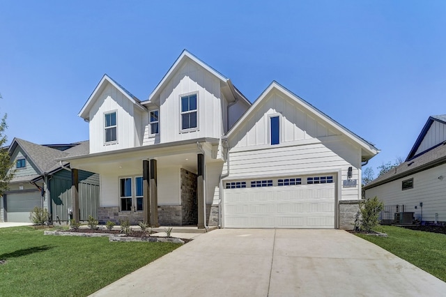 modern farmhouse style home featuring a front yard, a garage, central AC, and covered porch