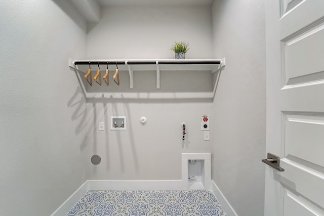 clothes washing area featuring gas dryer hookup, washer hookup, hookup for an electric dryer, and light tile patterned flooring