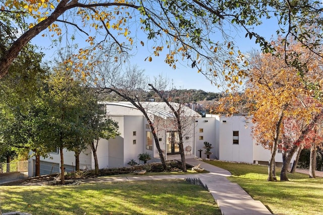 2102 N Oak Canyon Rd, Austin, TX 78746 - view of front of property featuring stucco siding