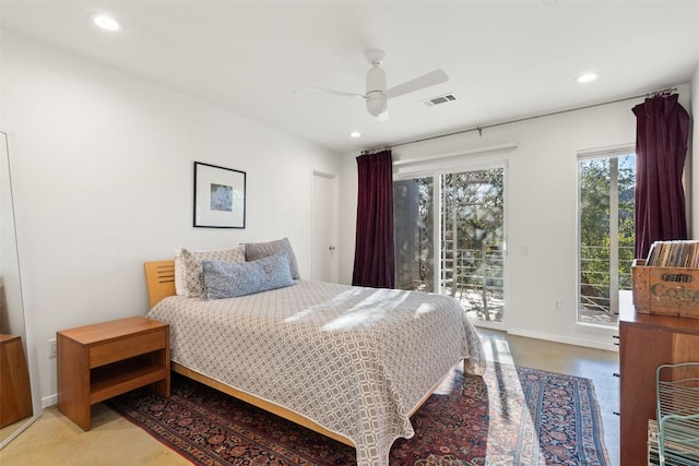 bedroom featuring ceiling fan, concrete flooring, and access to outside