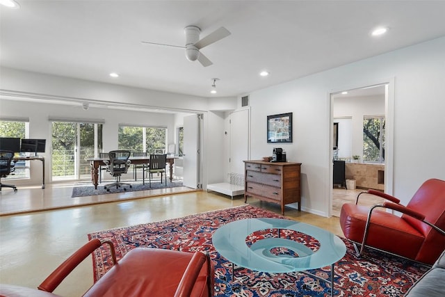 living room featuring ceiling fan