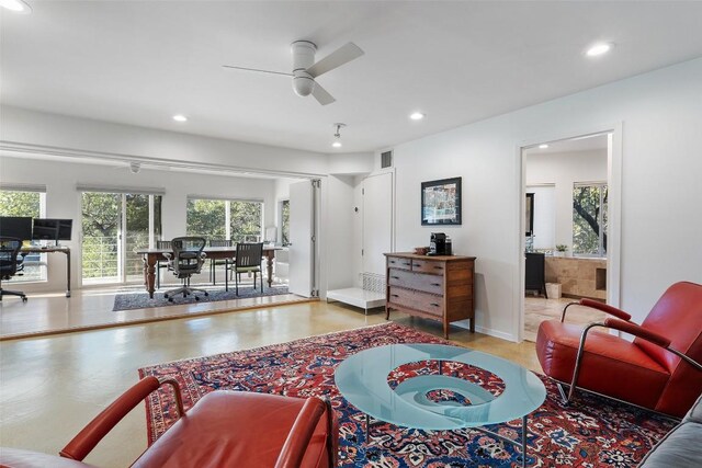 2102 N Oak Canyon Rd, Austin, TX 78746 - living room with recessed lighting and ceiling fan