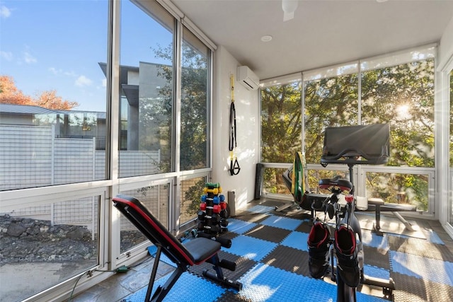 sunroom / solarium featuring a wall mounted AC