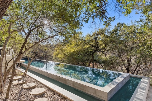 2102 N Oak Canyon Rd, Austin, TX 78746 - view of pool with a swimming pool