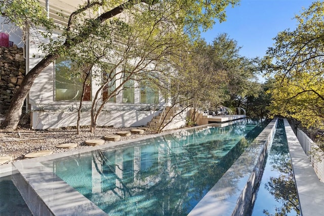 2102 N Oak Canyon Rd, Austin, TX 78746 - view of pool with an infinity pool
