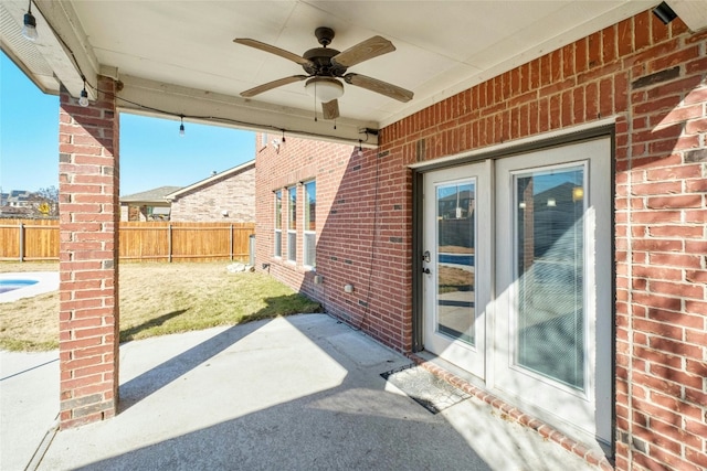 view of patio / terrace featuring french doors and ceiling fan