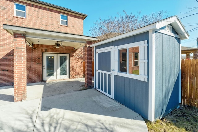 exterior space featuring a patio area, french doors, and ceiling fan