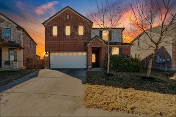 view of front property with a garage