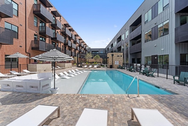 view of swimming pool featuring a patio