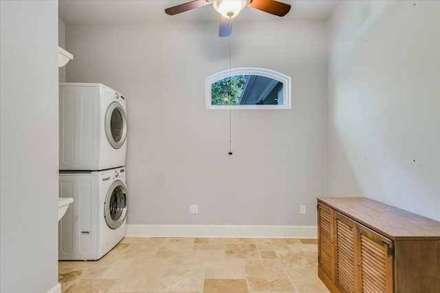 washroom featuring ceiling fan and stacked washing maching and dryer