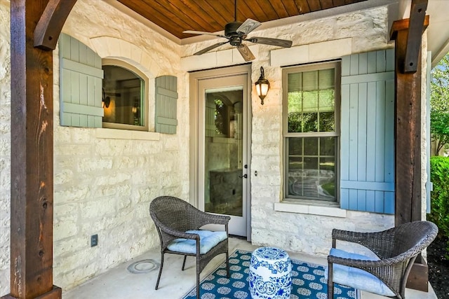 entrance to property featuring ceiling fan